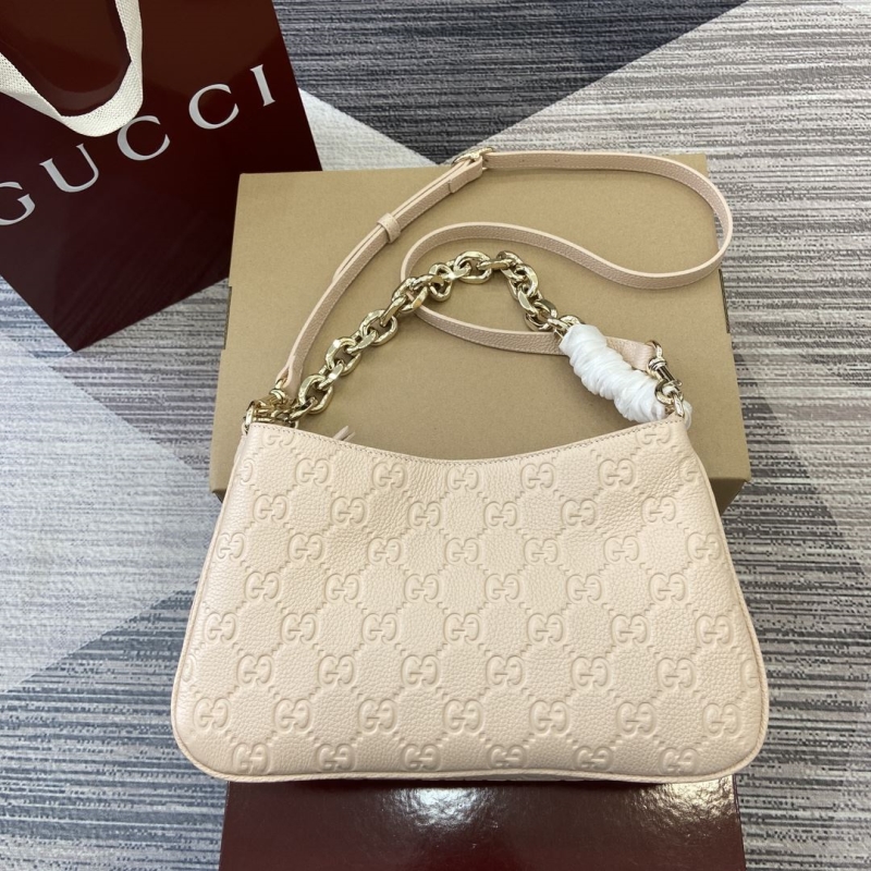 G*u*i top handle bags
